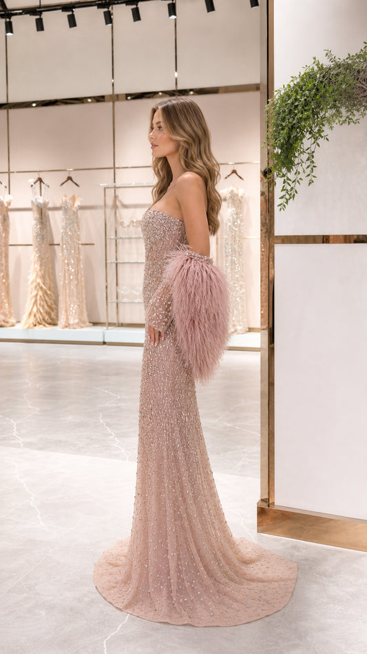 Side view of Blush Pink embellished mermaid gown showing fitted silhouette and train
