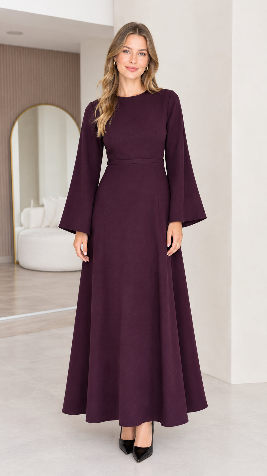 Front view of a burgundy women's long sleeve A-line maxi dress with a defined waist
