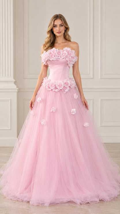 Front view of model wearing pink strapless 3D floral rosette tulle ball gown