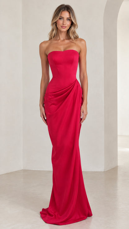 Model wearing a vibrant red strapless sweetheart draped maxi evening gown front view