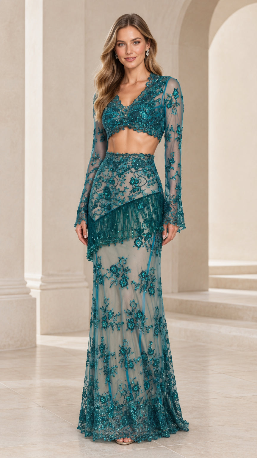 Front view of model wearing Teal two-piece sequin lace evening gown with long sleeves and beaded fringe skirt