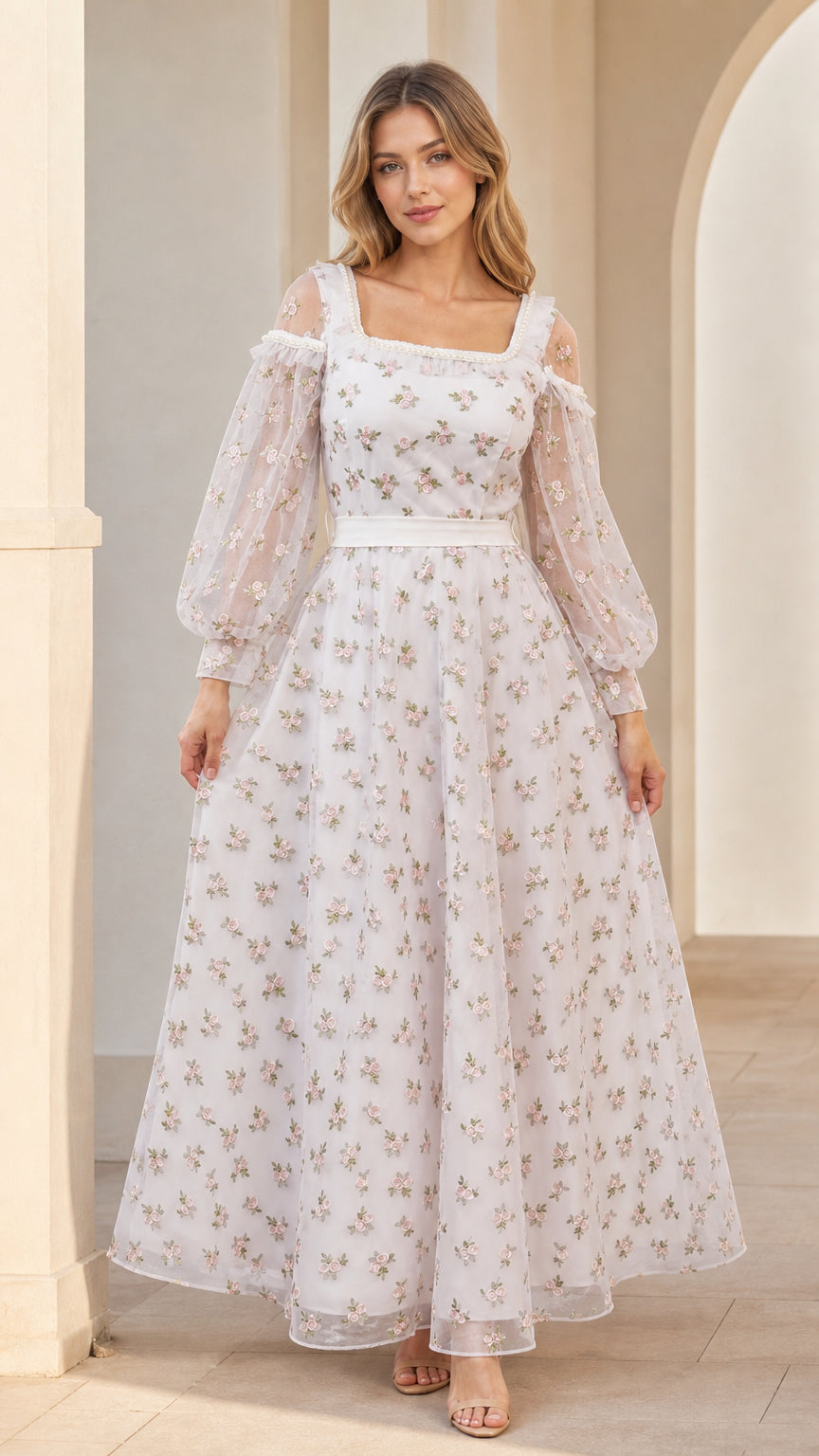 Front view of model wearing white floral embroidered square neck maxi dress with cold-shoulder puff sleeves