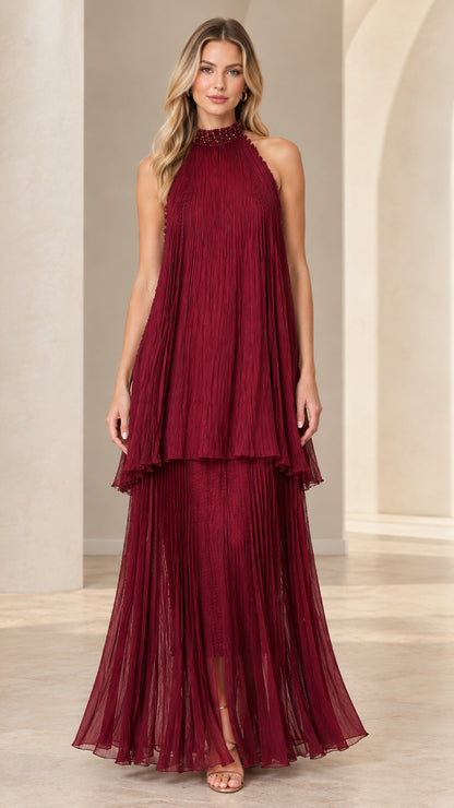 Burgundy pleated tiered halter neck maxi dress with beaded collar front view