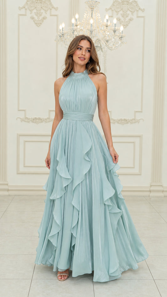 Front view of light blue halter neck pleated maxi dress with cascading ruffles