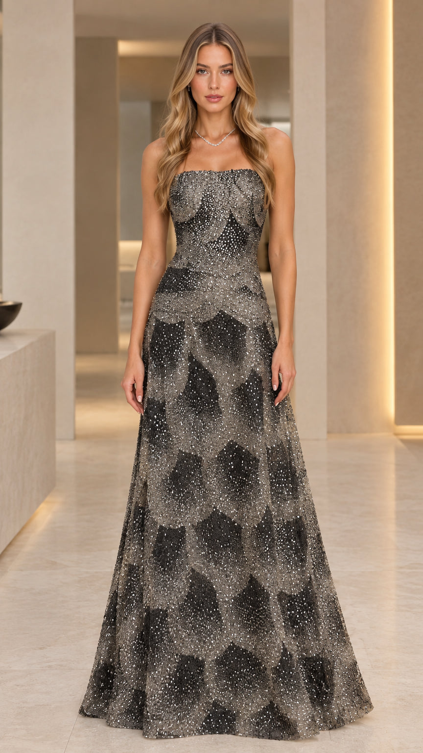 Front view of black strapless glitter scallop pattern evening maxi dress