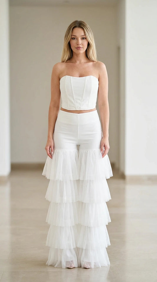 White strapless corset top and tiered tulle flare pants two-piece set front view