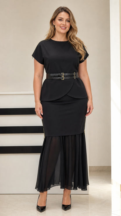 Front view of black belted peplum top and chiffon mermaid skirt set on model