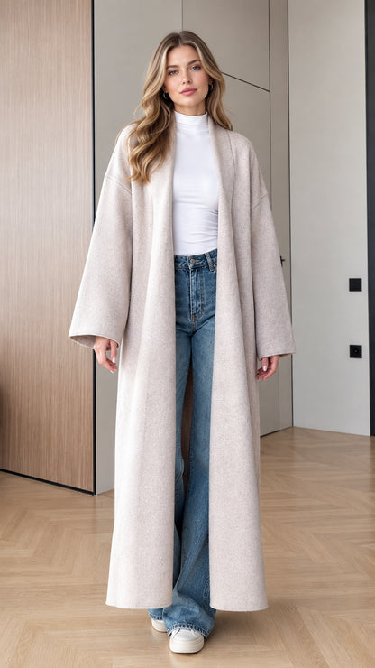 Front view of model wearing Oatmeal longline open-front maxi duster coat with jeans