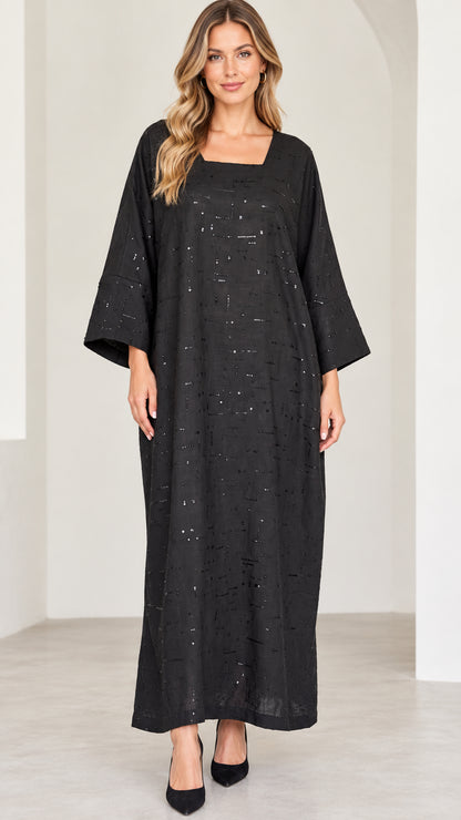 Front view of model wearing black square neck sequin embellished kaftan maxi dress