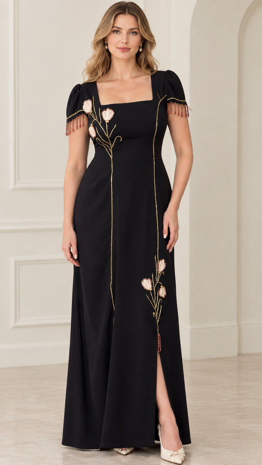 Front view of black square neck maxi dress with floral embroidery and beaded sleeve fringe