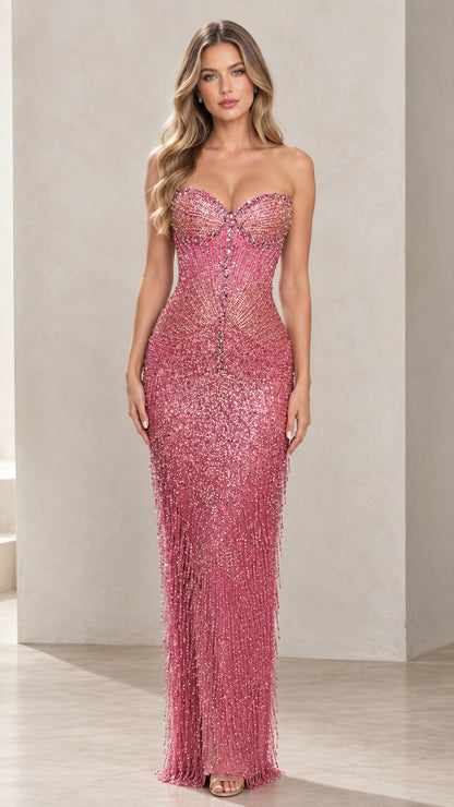 Front view of woman wearing strapless rose pink beaded fringe evening gown