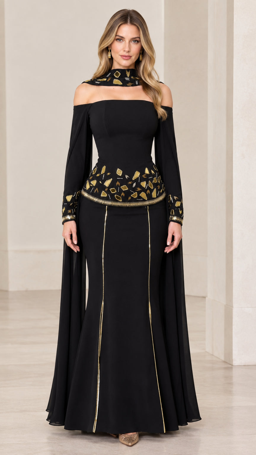 Front view of black floor-length mermaid evening gown with embellished collar and cape sleeves