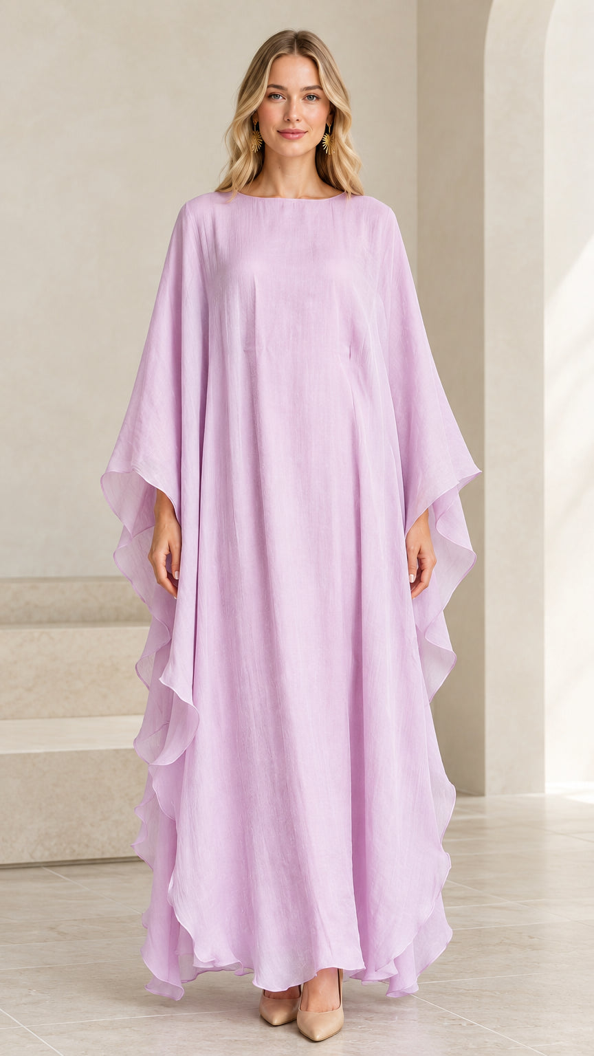 Full front view of model wearing lilac cascading ruffle kaftan maxi dress