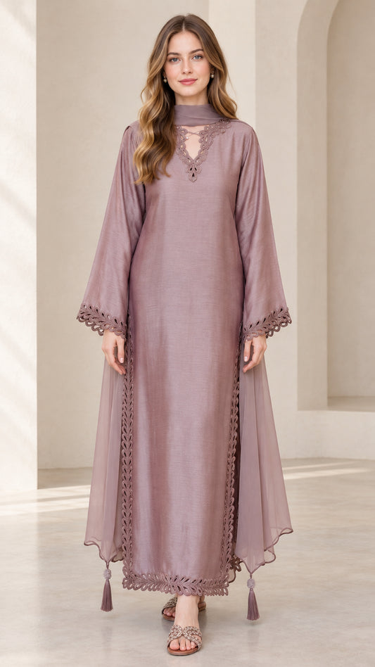 Front view of model wearing dusty mauve embroidered maxi kaftan dress with scarf neck