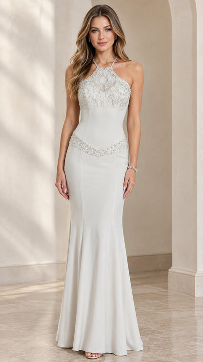 Front view of model wearing white halter neck beaded mermaid evening gown