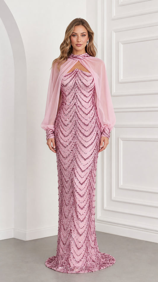 Front view of woman wearing pink sequin column evening gown with sheer chiffon cape overlay
