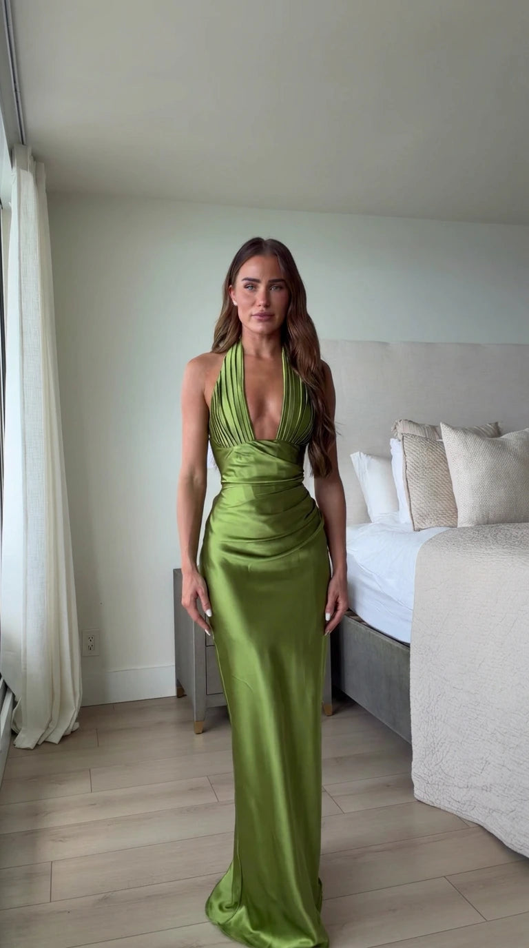Front view of olive green halter neck pleated satin maxi gown