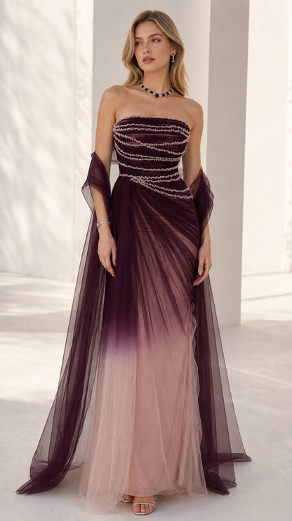 Full-length front view of the strapless beaded bodice evening gown in burgundy ombre tulle with matching wrap