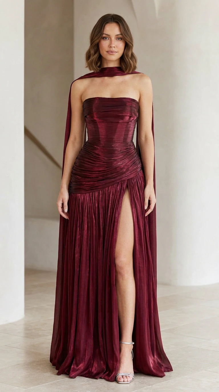 Burgundy strapless metallic pleated maxi evening dress with scarf cape front view