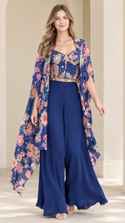 Front full-length view of royal blue 3-piece floral cape top and palazzo pants set