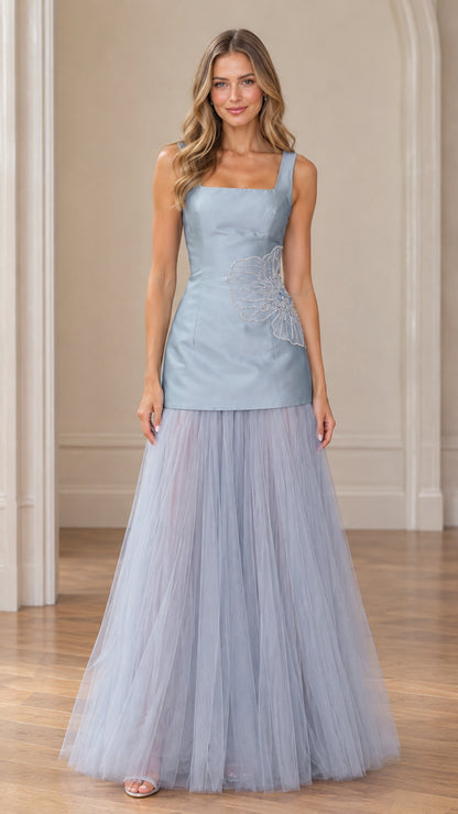 Dusty blue square neck drop waist evening dress with beaded floral detail and full tulle skirt front view