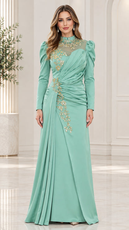 Mint green long sleeve evening gown with gold embroidery and pleated waist front view
