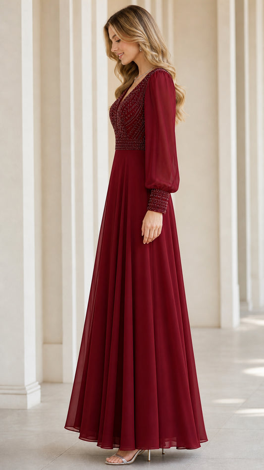 Burgundy beaded bodice A-line formal gown side profile view