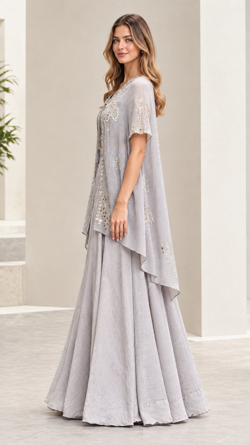 Side angle view of silver gray embroidered cape and palazzo pants set