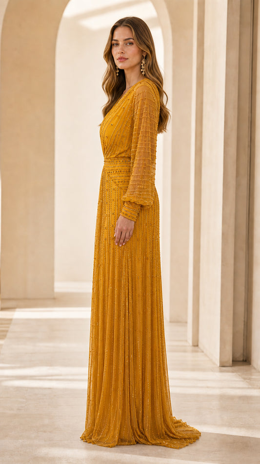 Side profile of model in mustard yellow maxi dress