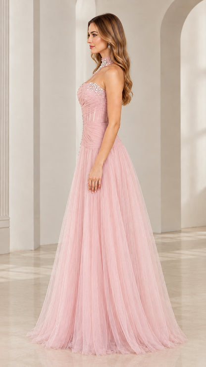 Side profile view of blush pink formal tulle gown showing flowing A-line skirt silhouette