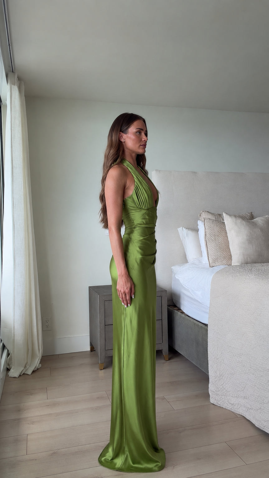 Side profile view of olive green ruched satin formal evening dress