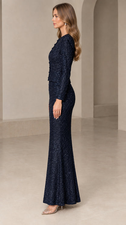 Side profile of model wearing Navy Blue sparkling two-piece formal gown set