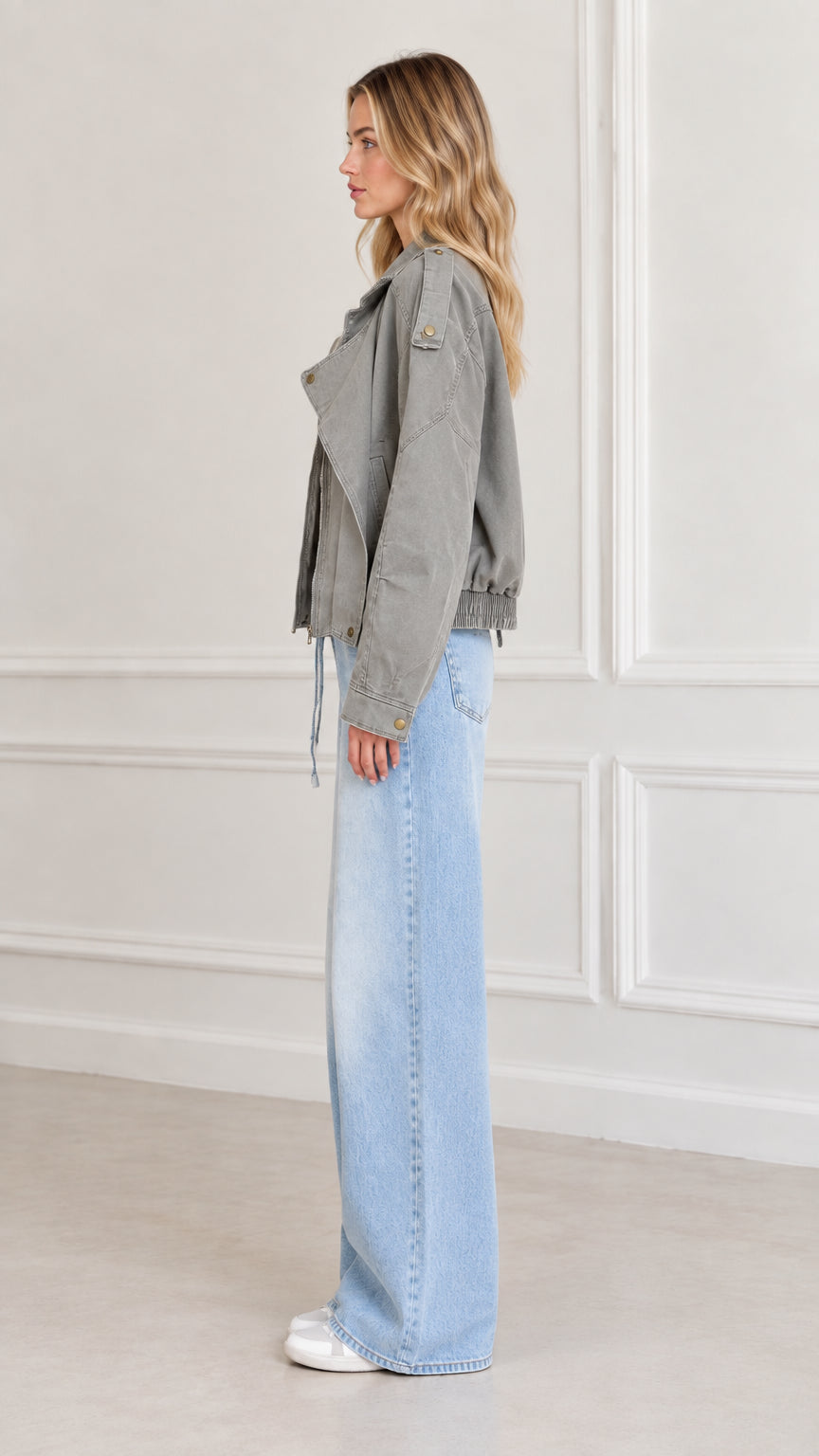 Side profile of model in Sage Green relaxed twill moto jacket