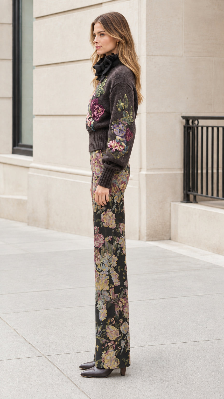 Side profile of model wearing Charcoal floral knit sweater and matching pants