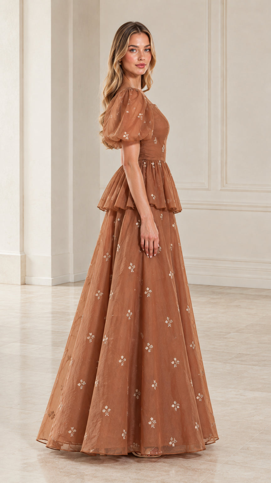 Side profile view of woman modeling toffee brown sheer sleeve formal evening dress