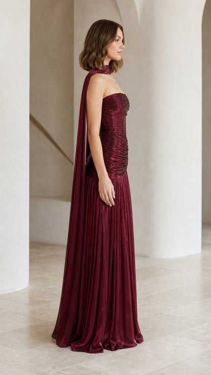 Burgundy pleated formal gown with high leg slit side view