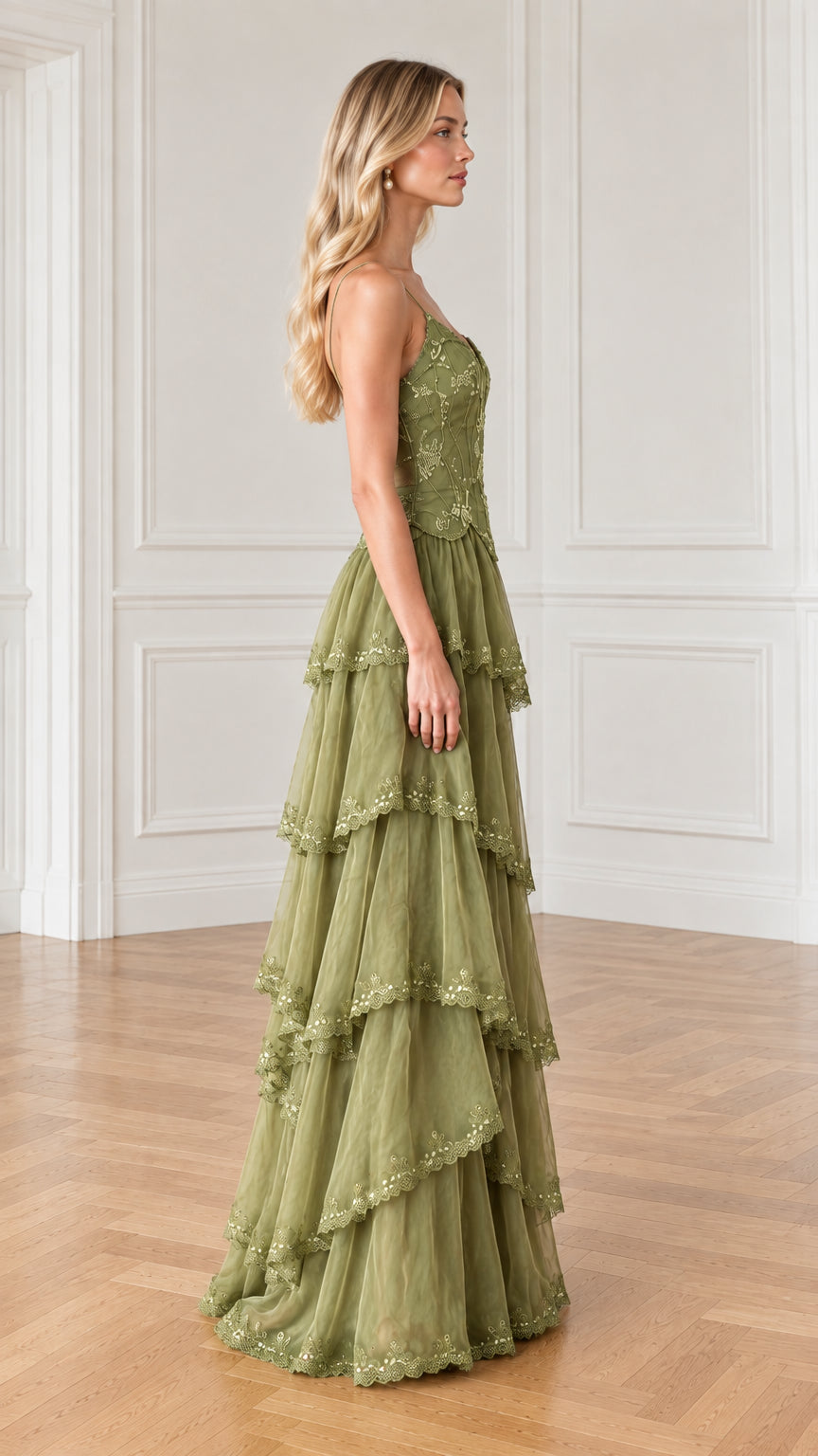 Side angle of olive green tiered ruffle evening gown