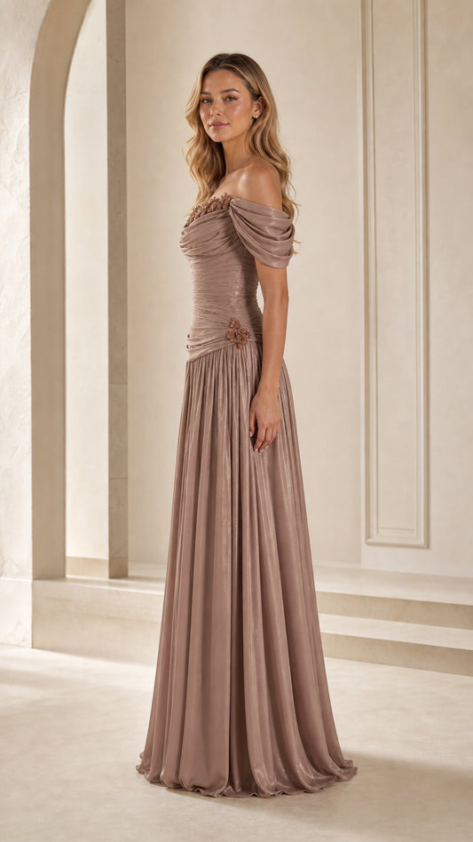 Three-quarter view of taupe pleated formal maxi dress with ruched bodice