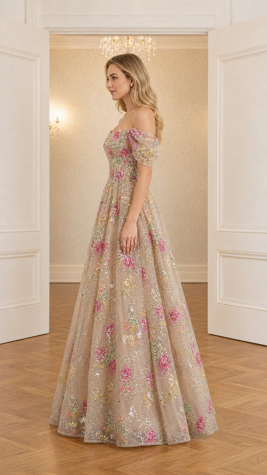 Side profile of champagne floral embroidered tulle formal gown