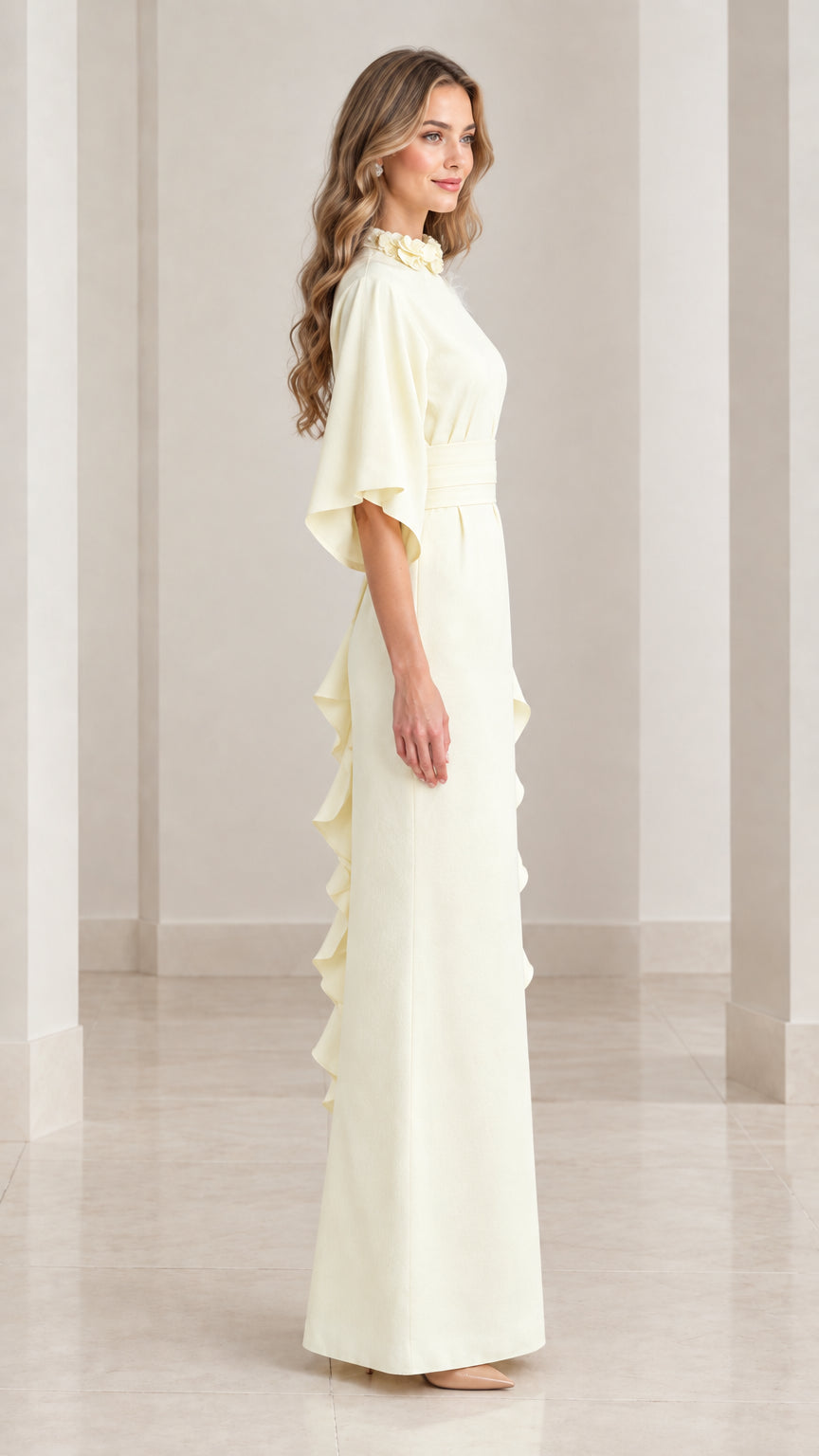 Side profile of elegant butter yellow column evening gown highlighting side ruffle detail