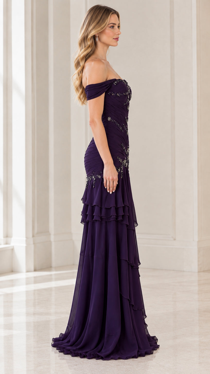 Side profile view of plum off-the-shoulder formal gown with tiered ruffles