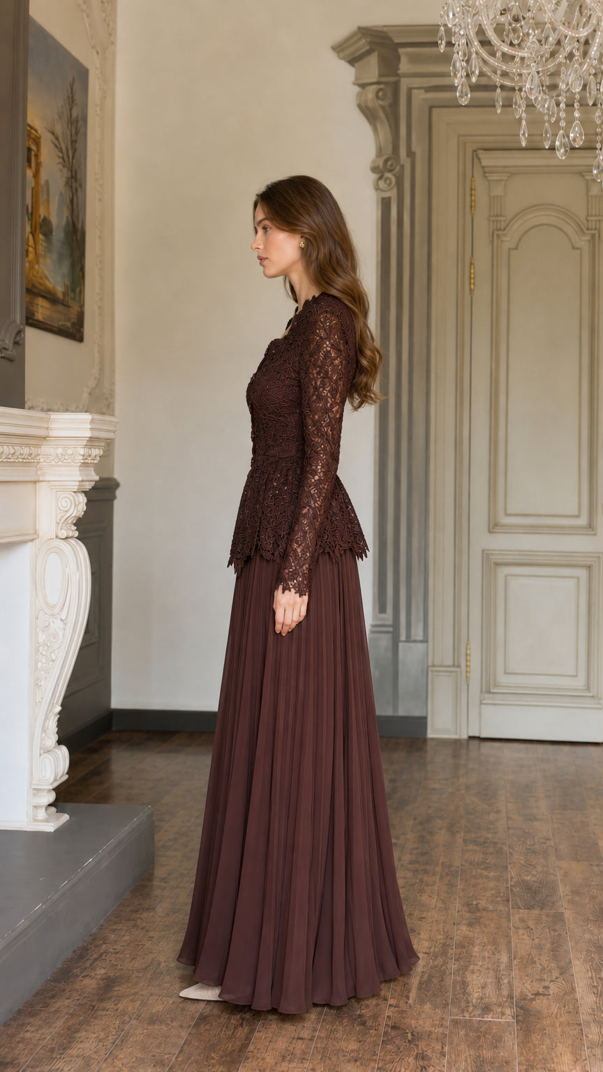Side profile view of Chocolate Brown lace peplum evening gown with floor-length pleated skirt