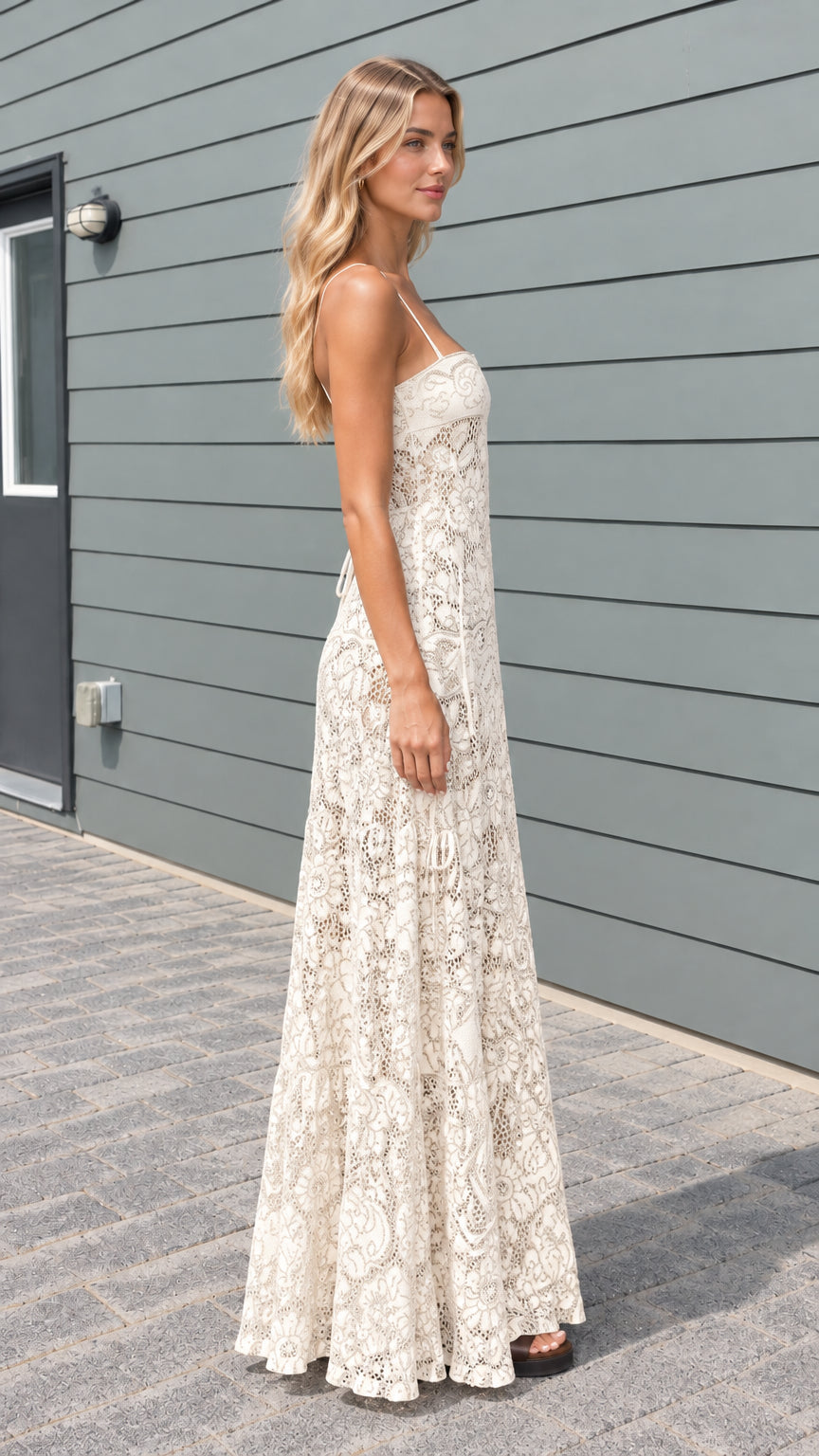 Model wearing cream floral lace maxi dress side angle view