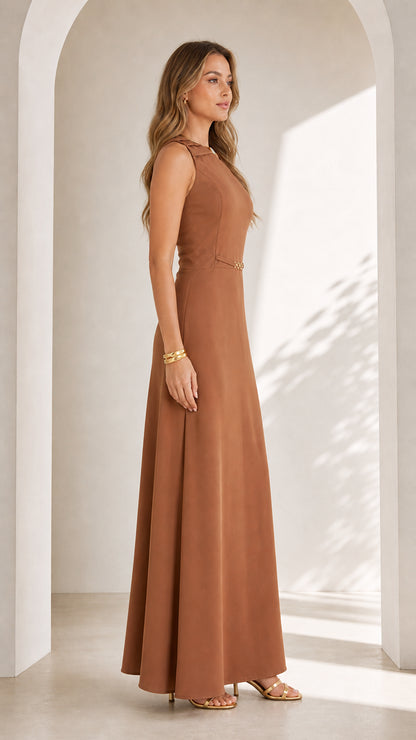 Side profile view of woman modeling caramel brown sleeveless maxi dress