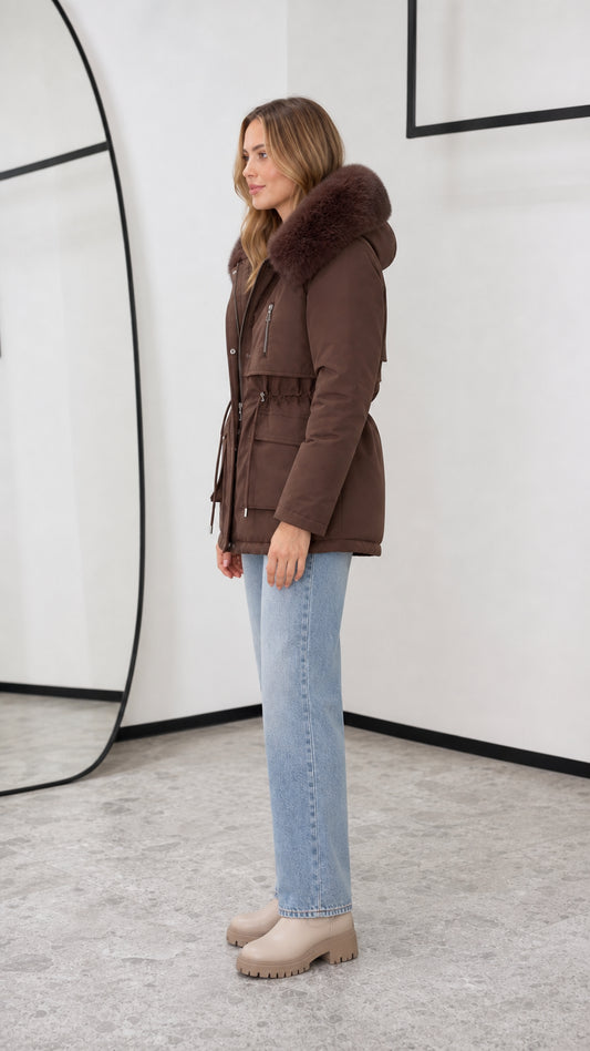 Side view of chocolate brown drawstring waist hooded winter parka jacket