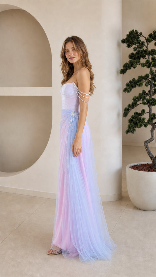 Side profile view of model wearing pastel blue and pink tulle formal maxi dress