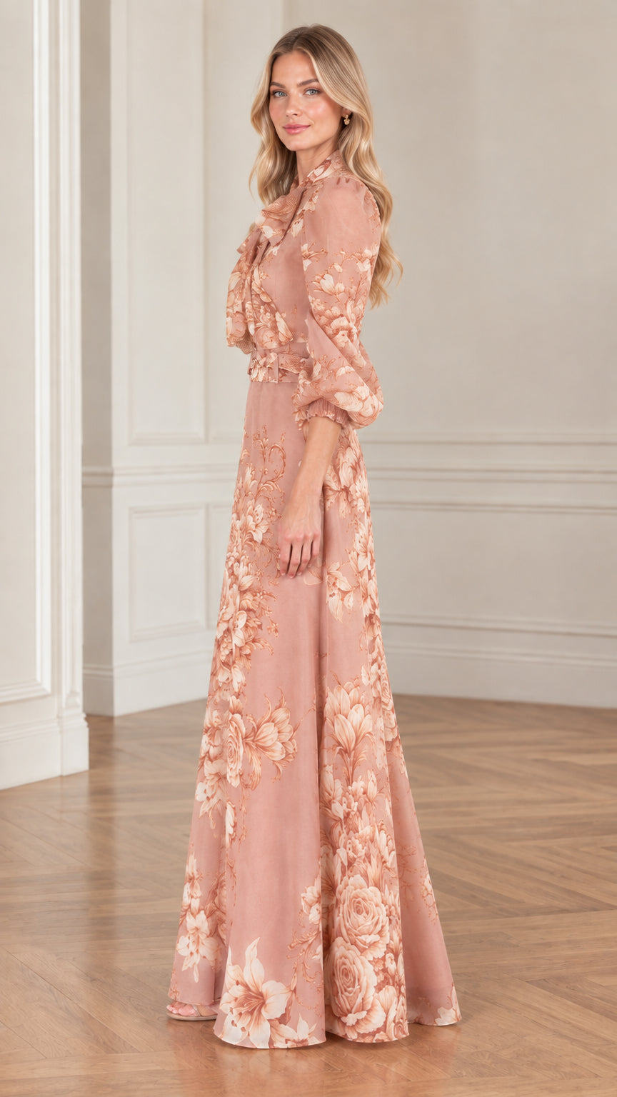 Side profile view of woman modeling dusty rose floral belted maxi gown