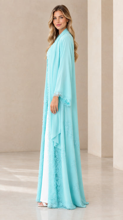 Side profile view of aqua blue lace trim maxi chiffon duster cardigan