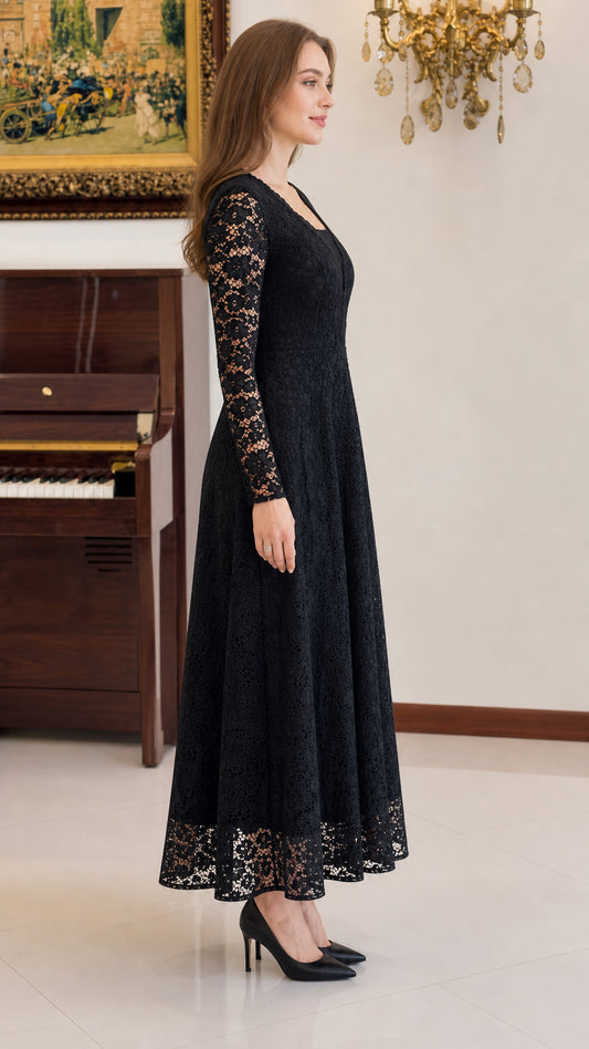 Side profile of woman wearing black long sleeve lace A-line maxi dress