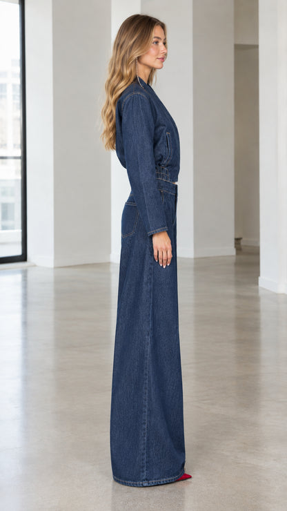 Side profile view of dark blue denim matching set highlighting the wide leg silhouette